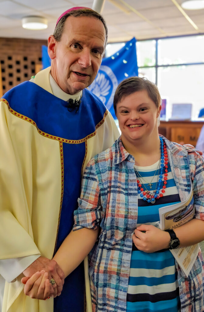 Sarah, a resident at Gabriel Homes, meeting the Archbishop.