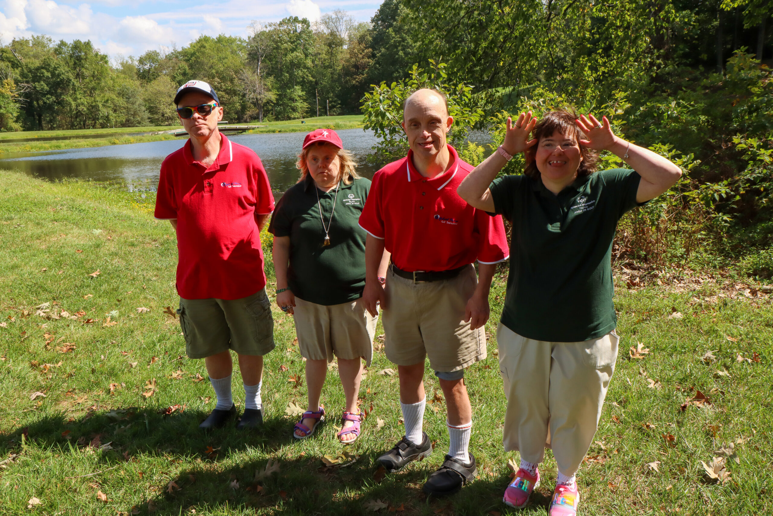 John, Kari, John, and January at the golf tournament.