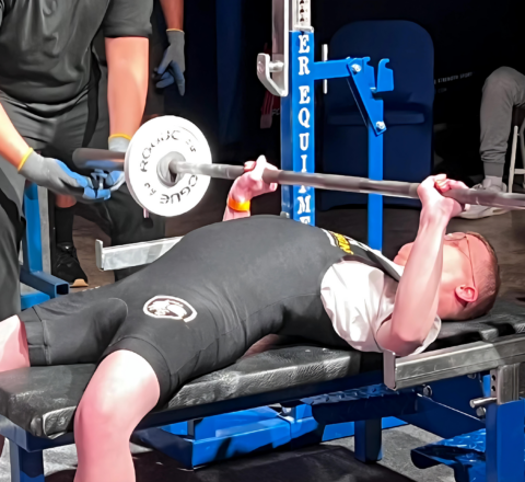 Gabriel Homes resident powerlifting at tournament.