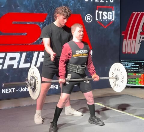Gabriel Homes resident powerlifting at tournament.