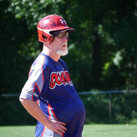 Gabriel Homes resident playing softball.