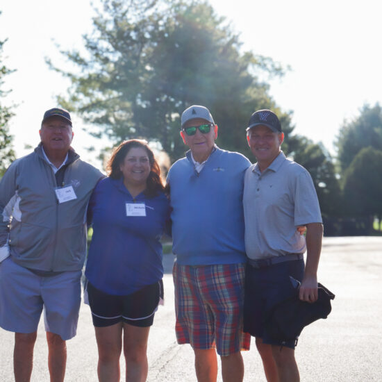 (Left to right) Jack Mannion, Michele Bolos, Michael Holupka, and a golfer at the annual Gabriel Homes Golf Tournament.