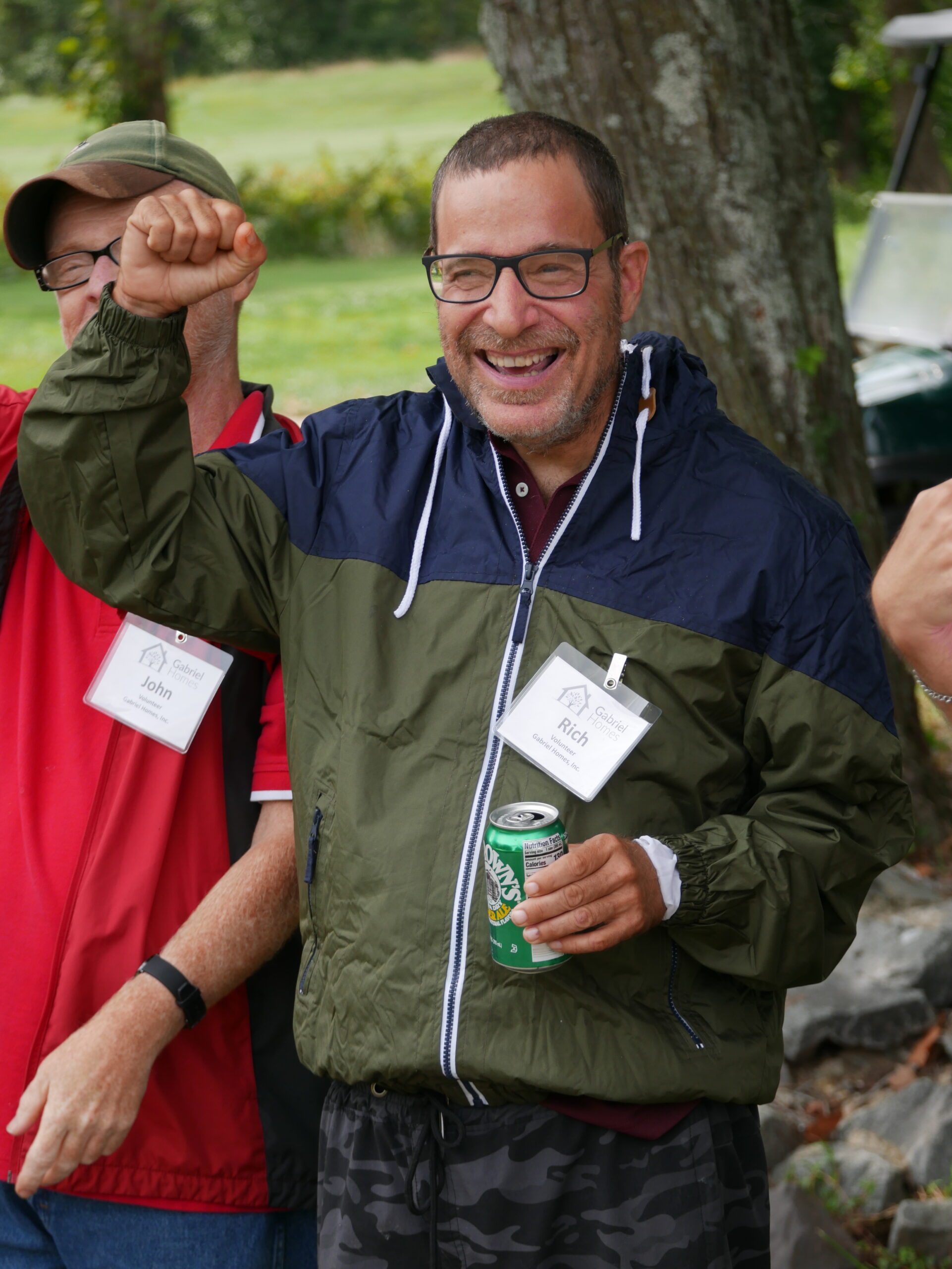 Gabriel Homes resident cheering at the 2024 golf tournament.
