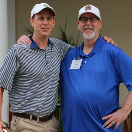 Gabriel Homes resident (right) at the 2024 golf tournament.