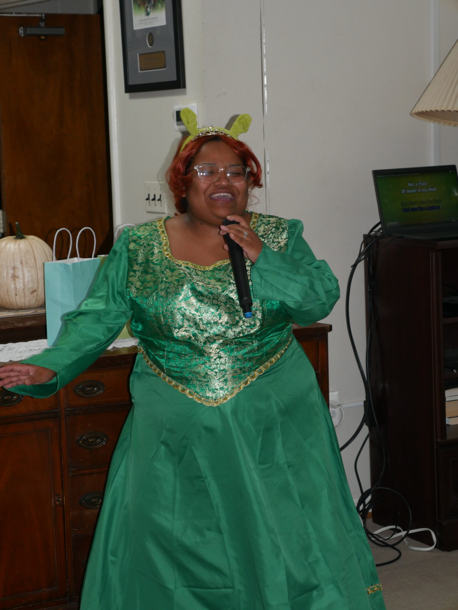 Gabriel Homes staff performing karaoke.