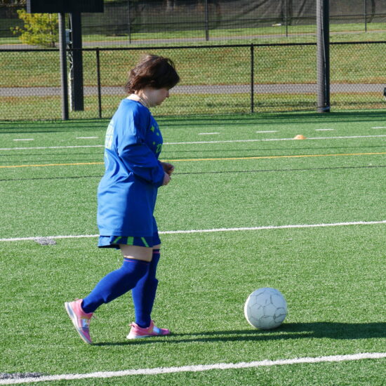 Gabriel Homes resident playing Special Olympics soccer.