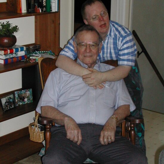 Gabriel Homes resident (back) with their dad (front).