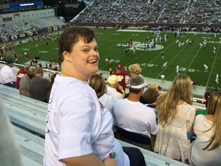 Gabriel Homes resident at a football stadium.