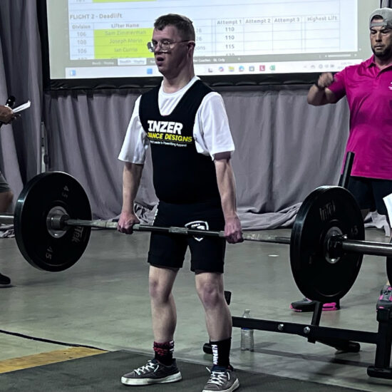 Gabriel Homes resident powerlifting at the Special Olympics.
