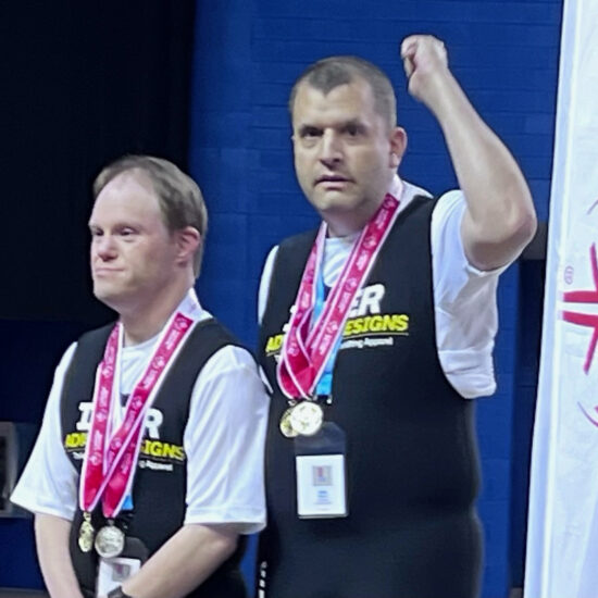 Gabriel Homes residents at powerlifting tournament.