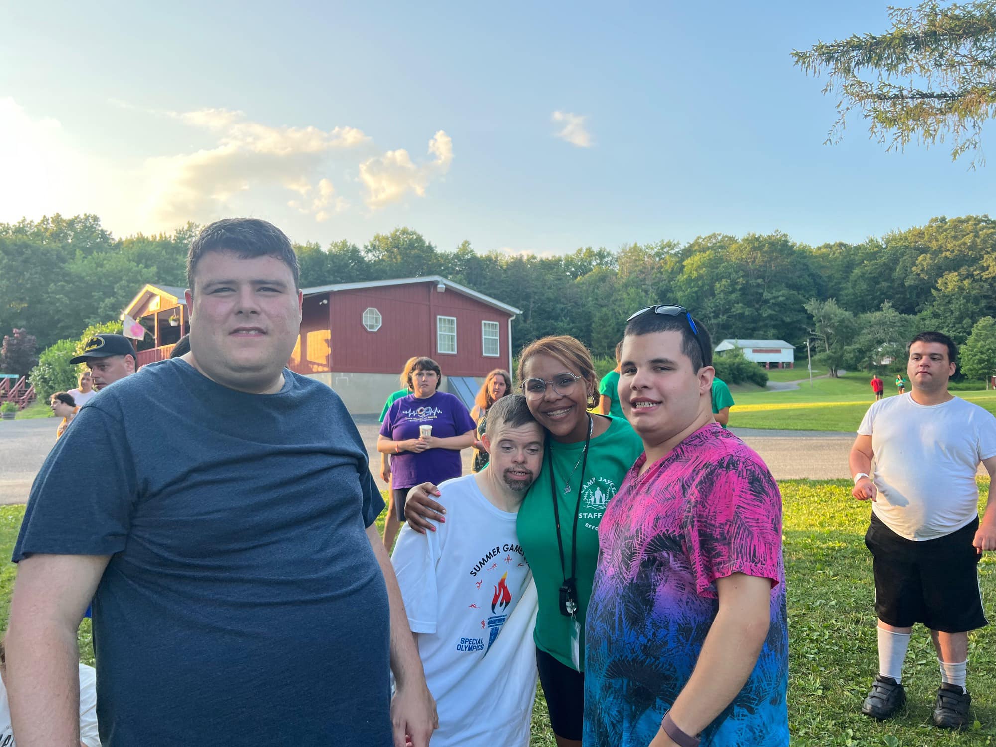 Gabriel Homes resident (second to the left) at a summer camp.