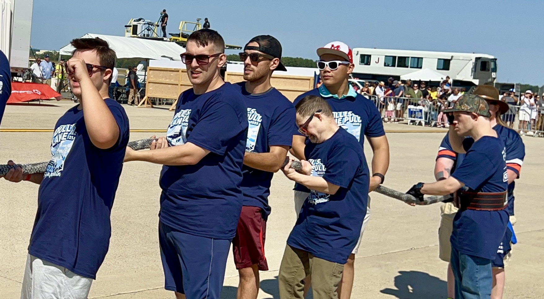 Powerlifters grabbing the rope for the 2025 Dulles Plane Pull.