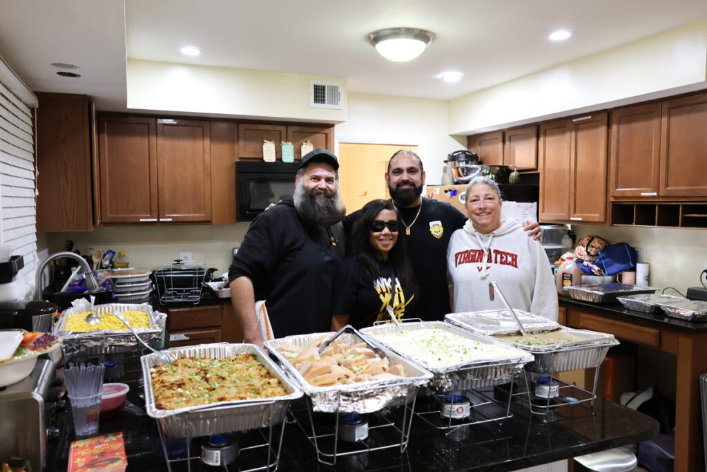 Route 7 Brewing with executive director Lynn Davis (right) catering a Thanksgiving dinner.