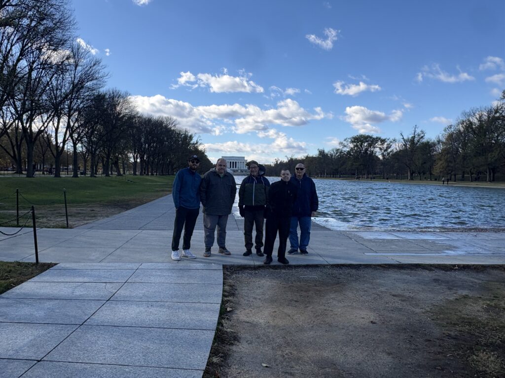 Gabriel Homes residents and staff (left) at the Reflecting Pool during Veterans Day in Washington, D.C.