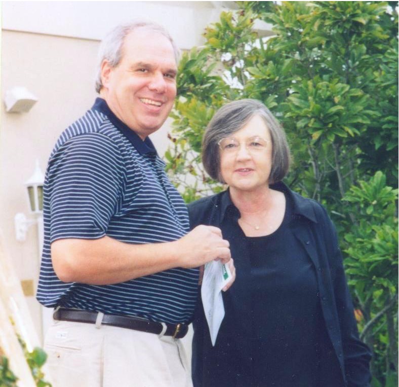 Then-Father Bob Cilinski (left) with a participant at the Gabriel Homes Golf Tournament.