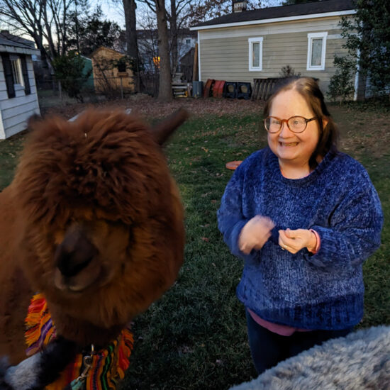 Gabriel Homes resident with an alpaca.
