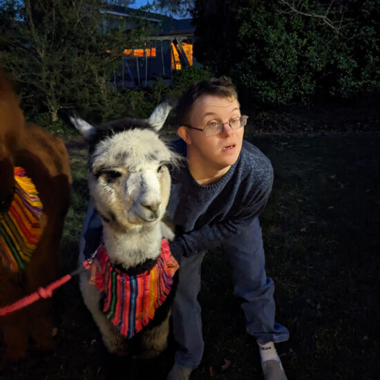 Gabriel Homes resident with an alpaca.