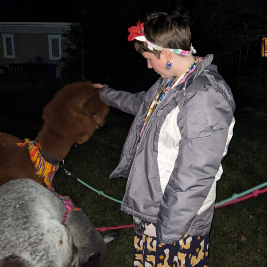 Gabriel Homes resident with an alpaca.