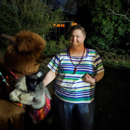 Gabriel Homes resident with an alpaca.