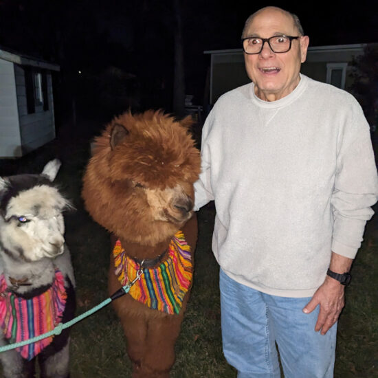 Gabriel Homes resident with an alpaca.