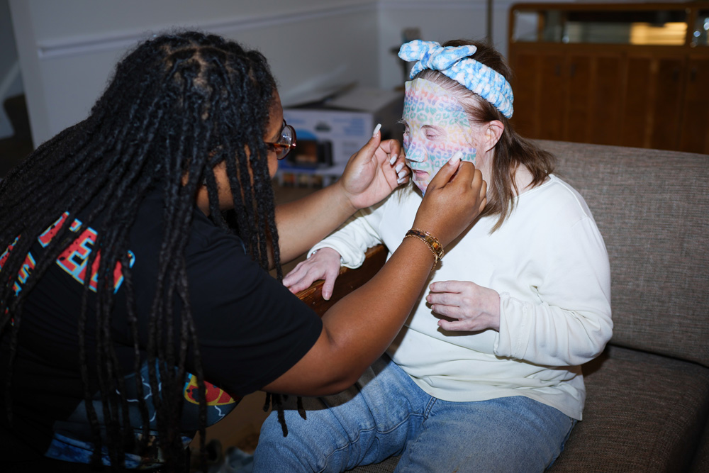 Gabriel Homes resident receiving a face mask.