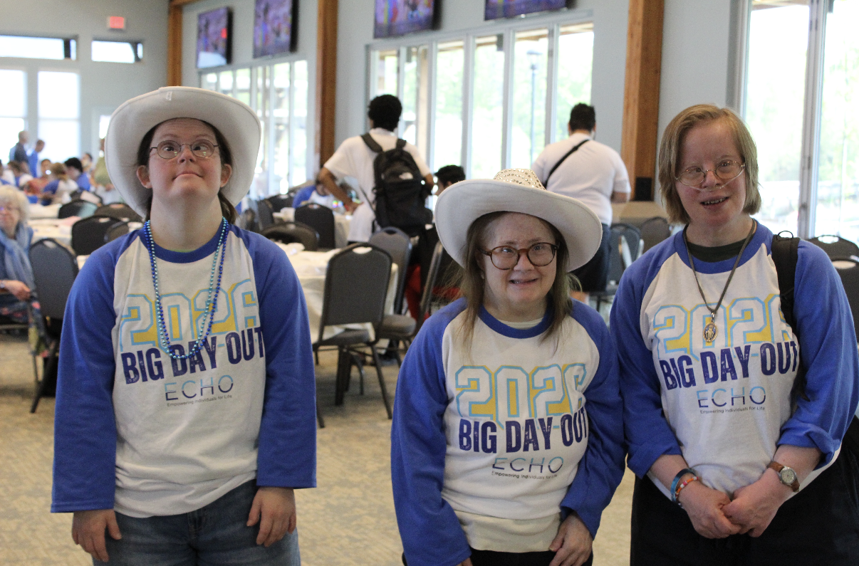 Gabriel Homes resident (center) at ECHO with friends.