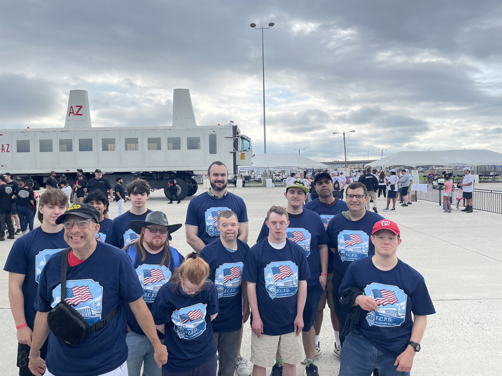Gabriel Homes residents in Special Olympics powerlifting at the Dulles Day Plane Pull 2026.