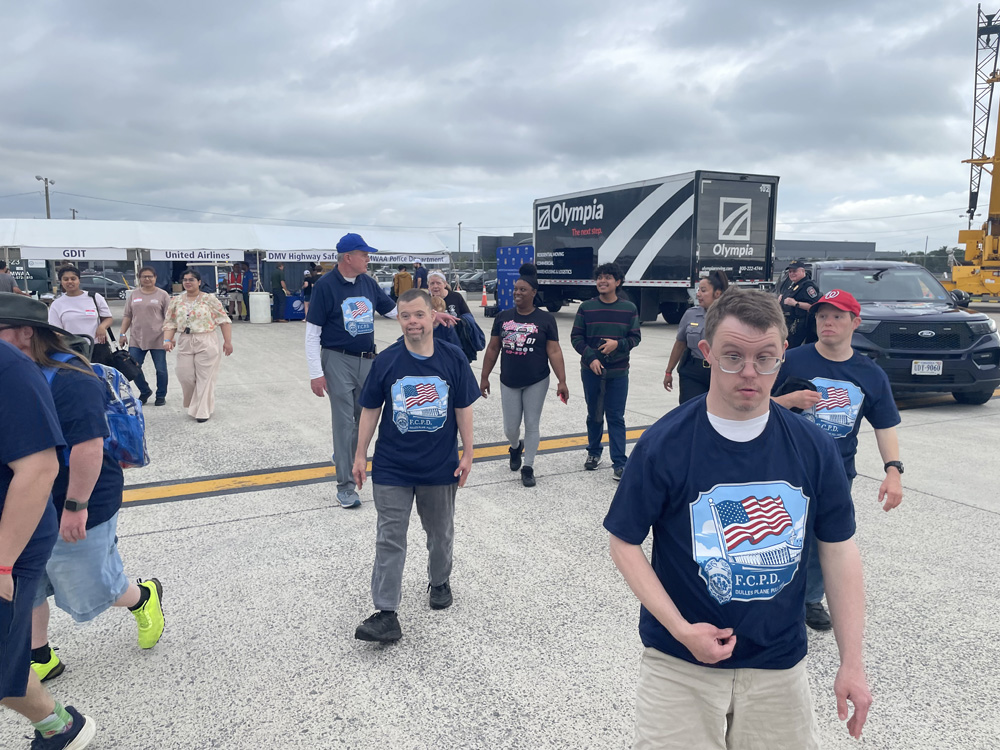 Gabriel Homes residents in Special Olympics powerlifting at the Dulles Day Plane Pull 2026.