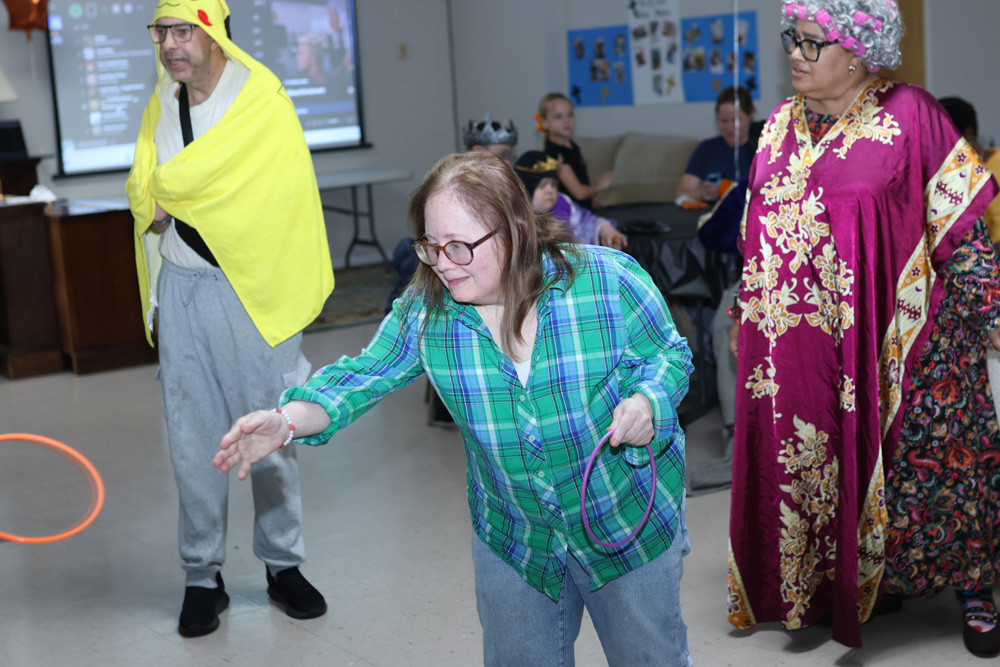 Gabriel Homes resident playing a ring toss game.