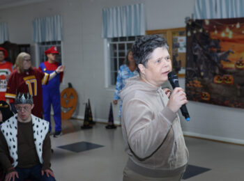 Gabriel Homes resident performing karaoke.