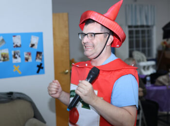 Gabriel Homes resident performing karaoke.