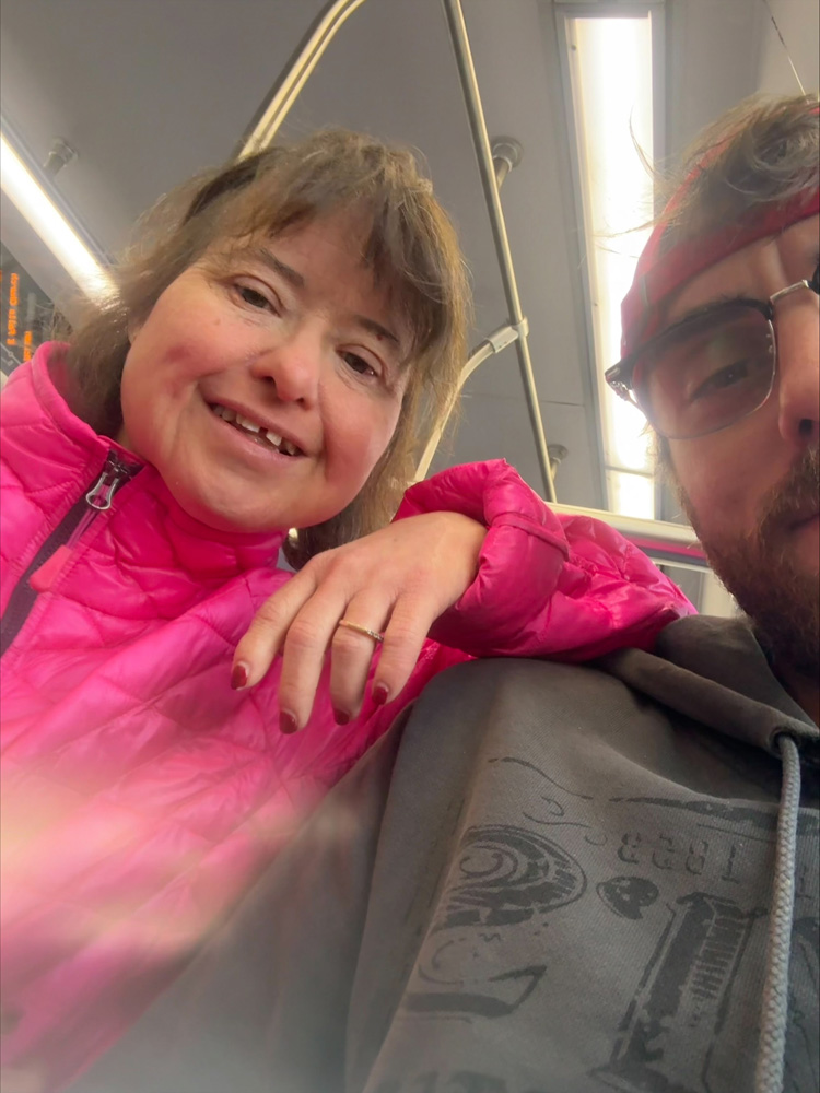 Gabriel Homes resident (left) with staff (right) on the Metro.