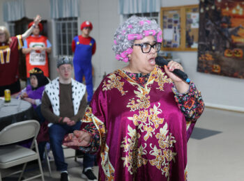 Gabriel Homes resident performing karaoke.