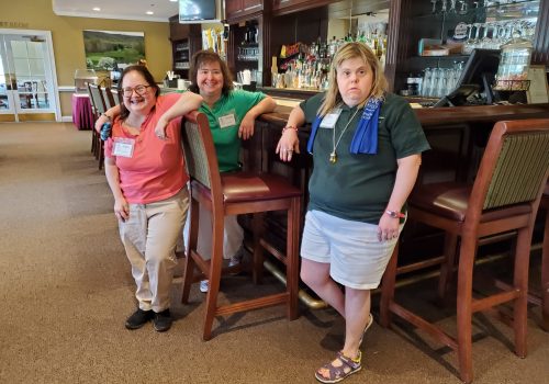 Angie, January, and Kari at the golf tournament.