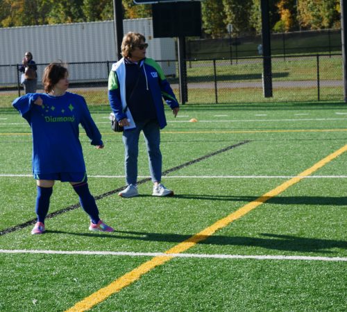 Gabriel Homes resident playing Special Olympics soccer.