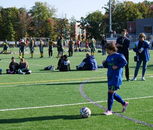 Gabriel Homes resident playing Special Olympics soccer.