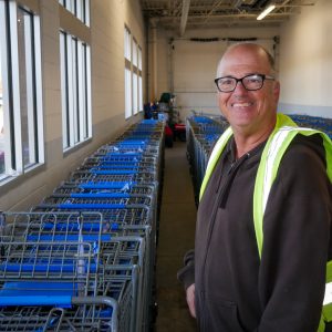 Gabriel Homes resident working at Walmart.