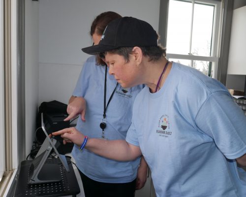 Gabriel Homes resident preparing coffee for customer.