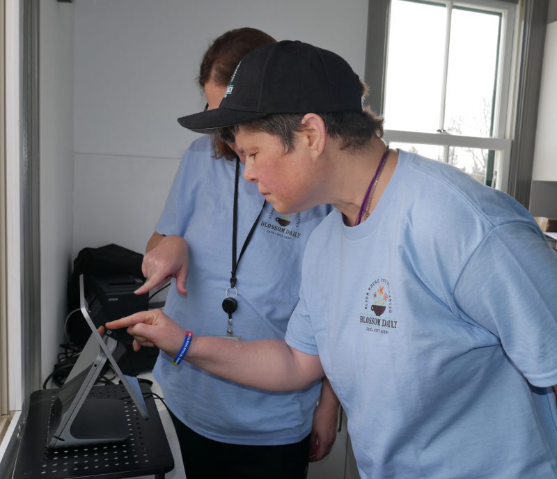 Gabriel Homes resident preparing coffee for customer.