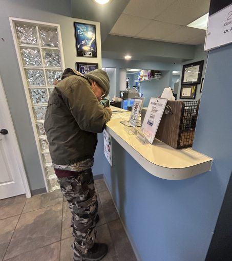 Gabriel Homes resident checking in at the dentist's in Reston.