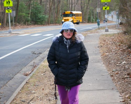 Gabriel Homes resident on a walk on a trail in Reston.