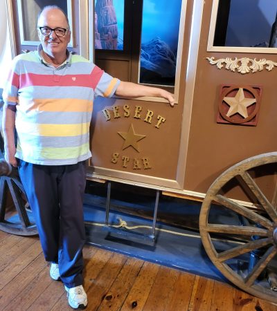 Gabriel Homes resident posing at sites at the American Frontier.