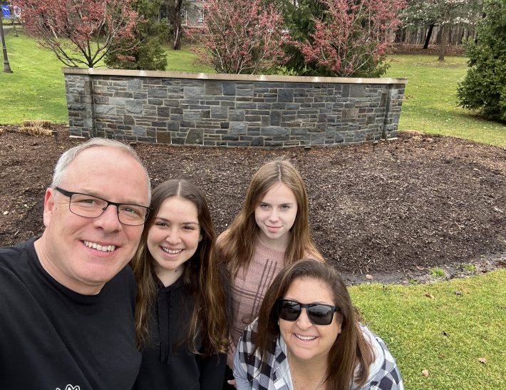 Gabriel Homes board chair Michele Bolos (right) on college tour. Her experience sending her daughter (second to the left) to college is similar to adults with IDD who transition to independent living.