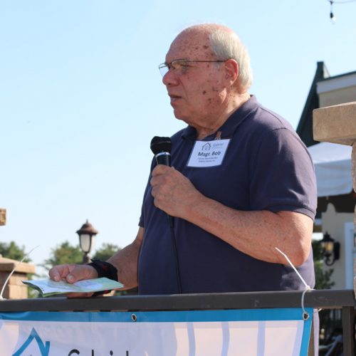 Monsignor Bob Cilinski delivering remarks at the 30th Annual Gabriel Homes Golf Tournament.