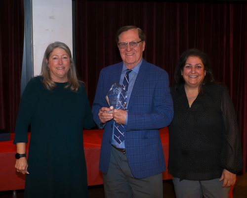 Left to right: Gabriel Homes Executive Director, Hall of Fame class of 2025 Tom Stringer, and Board Chair Michele Bolos.