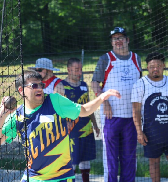 Chantilly Electric athlete competing in the shot put.