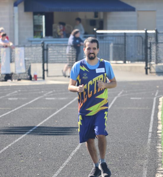 Chantilly Electric athlete running.