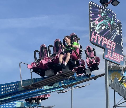 Gabriel Homes resident (front row, right) on a roller coaster ride.