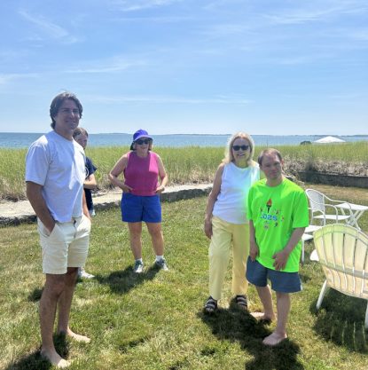 Gabriel Homes resident (right) with family in Maine.