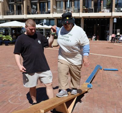 Gabriel Homes resident (right)doing a parkour exercise with MindShift Gym.